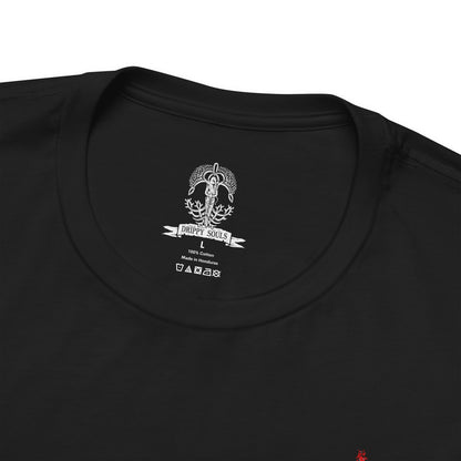 Folded T-shirt featuring Lichdragon Fortissax from Elden Ring, the legendary dragon bound by death and lightning. Once a fierce protector of Godwyn the Golden, Fortissax now rots in undeath, cloaked in red lightning and sorrow. This design captures the mythical scale and decayed majesty of the dragon locked in eternal mourning.