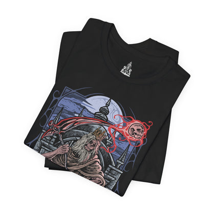 Image 5 of a T-Shirt design of Martyr Logarius from Bloodborne, standing atop the frozen rooftop of Cainhurst Castle as snow and arcane energy swirl through the air. His tattered robes and crown flutter in the storm while spectral skulls and crimson magic gather around his staff. The design captures the legendary executioner’s eternal vigil, guarding the secrets of Cainhurst through sacrifice and unwavering devotion.