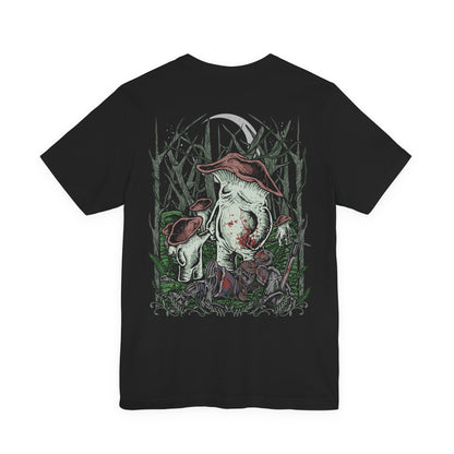 Image 5 of a T-Shirt artwork depicting the Mushroom People wandering through the forgotten depths of Darkroot Garden, surrounded by moss-covered ruins, towering trees, and drifting fog. Their distinctive fungal forms contrast with the dark woodland environment, creating an eerie yet whimsical scene. This design reflects the mysterious creatures hidden within one of Lordran's most atmospheric forests.