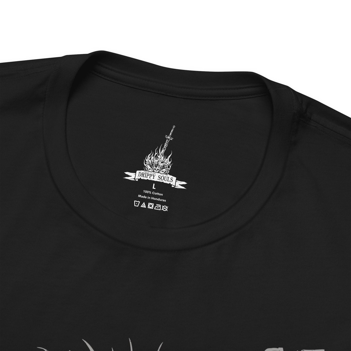 Folded T-Shirt design of the Old Demon King from Dark Souls III, towering within the burning Demon Ruins while gripping his enormous flaming hammer. Fiery embers, molten rock, and smoke surround the ancient demon as he prepares to unleash devastating flame attacks. The design captures his immense power, ancient origins, and the fading strength of one of the last great demons.