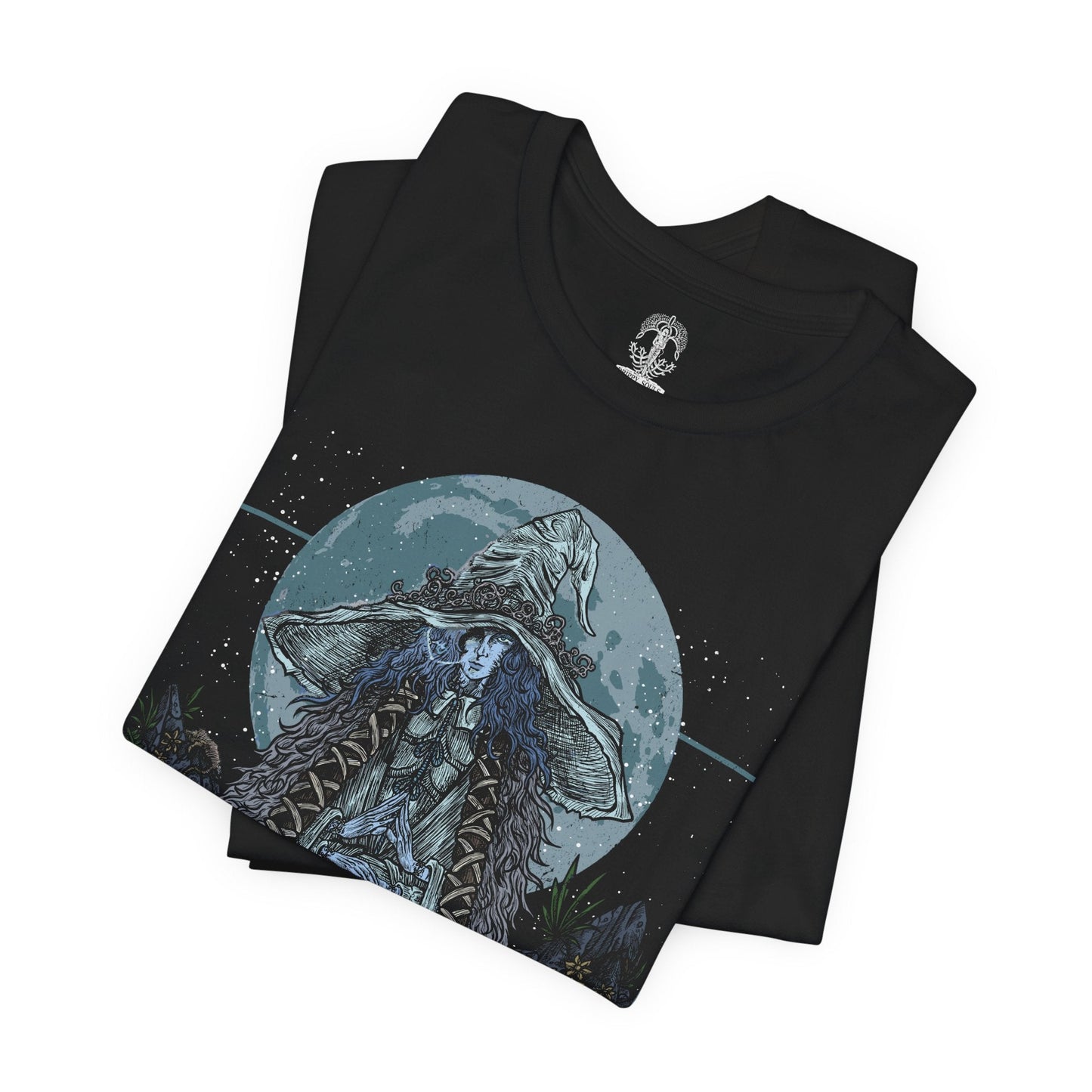 Image 5 of a T-shirt featuring Ranni the Witch from Elden Ring, the mysterious Lunar Princess and Empyrean who defied the Greater Will. Draped in a flowing blue cloak and crowned with her wide-brimmed witch’s hat, Ranni embodies quiet rebellion and arcane mystery. With her ethereal doll form and ties to the stars, she offers one of the game’s most profound and emotional questlines, symbolizing fate, sacrifice, and cosmic ambition.