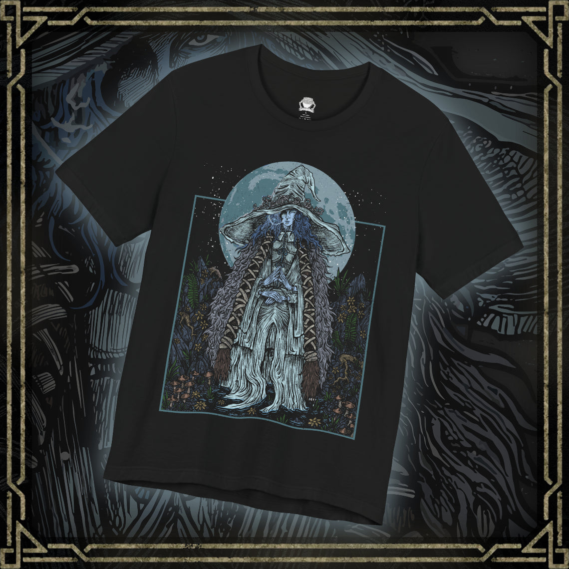 Thumbnail of a T-shirt featuring Ranni the Witch from Elden Ring, the mysterious Lunar Princess and Empyrean who defied the Greater Will. Draped in a flowing blue cloak and crowned with her wide-brimmed witch’s hat, Ranni embodies quiet rebellion and arcane mystery. With her ethereal doll form and ties to the stars, she offers one of the game’s most profound and emotional questlines, symbolizing fate, sacrifice, and cosmic ambition.
