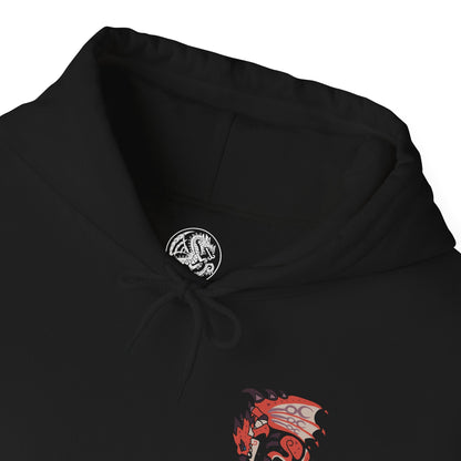 Folded Hooded Sweatshirt of Rathalos perched atop a rocky outcrop, wings partially unfurled as smoke and fire drift across a scorched battlefield. Its piercing gaze and armored scales radiate authority and danger, symbolizing its title as the King of the Skies. The composition emphasizes dominance, elemental fury, and the primal challenge faced by every hunter.