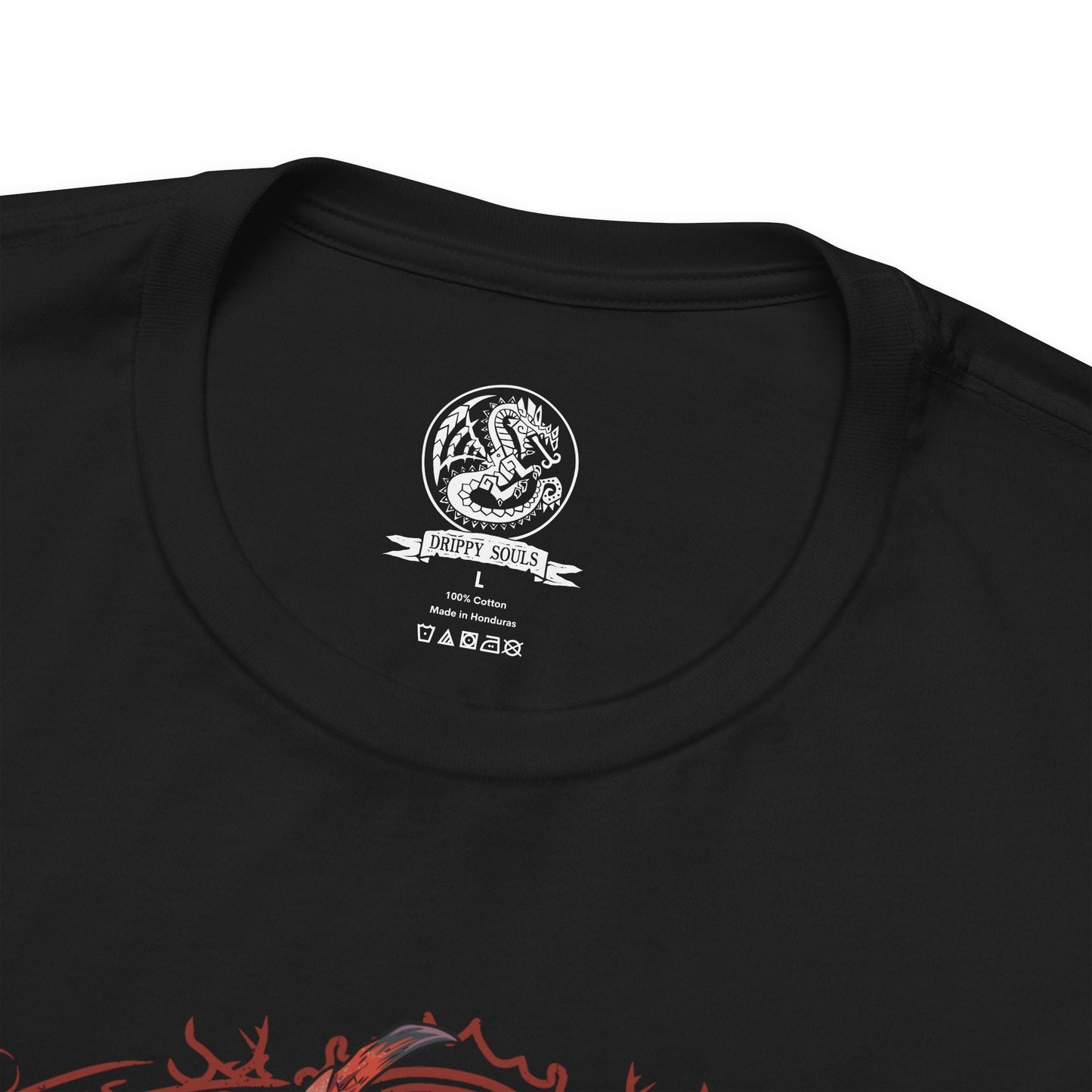 Folded T-shirt design of Rathalos from Monster Hunter, the King of the Skies, soaring above a volcanic landscape with wings spread wide. Flames erupt from its jaws as molten rock and ash rise from below, while its crimson scales gleam in the firelight. The design captures Rathalos’ dominance over the ecosystem, embodying aerial supremacy, raw power, and the relentless hunt.