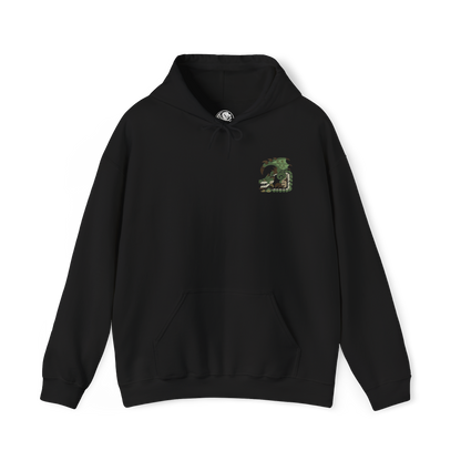 Image 4 of a Hooded Sweatshirt of Rathian perched upon a towering cliff, her green-scaled body surrounded by swirling smoke, flames, and drifting embers. Her wings are partially spread while her poisonous tail hangs ready to strike anything approaching her territory. The composition emphasizes regal dominance, primal aggression, and the unmistakable presence of one of Monster Hunter's most iconic Flying Wyverns.