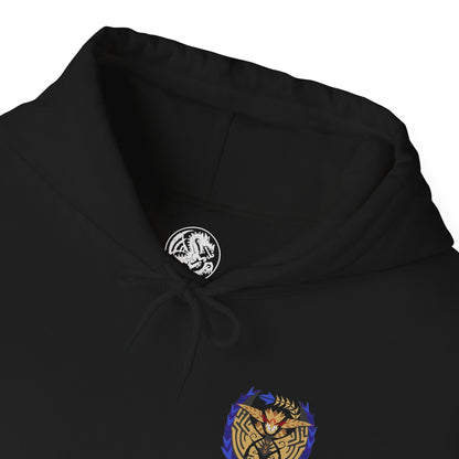 Folded Hooded Sweatshirt of Rey Dau perched atop towering desert cliffs, its gleaming golden scales illuminated by constant flashes of lightning while fierce winds whip sand across the barren landscape. Electrical energy courses through its massive wings as storm clouds gather overhead. The composition emphasizes regal dominance, elemental fury, and the breathtaking presence of Monster Hunter Wilds' iconic flagship flying wyvern.