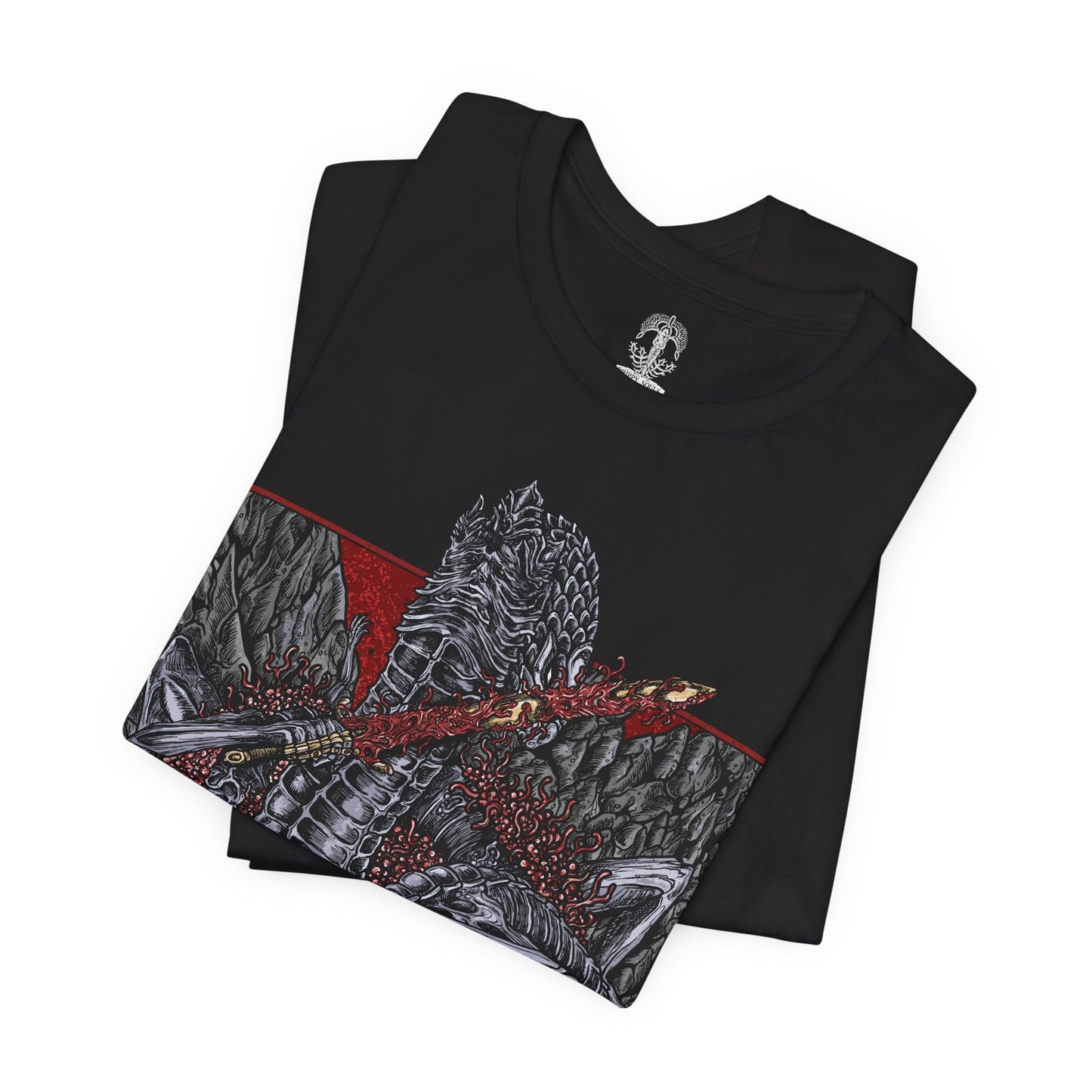 Image 5 of a T-shirt featuring Rykard, Lord of Blasphemy from Elden Ring, the demigod who fused with the God-Devouring Serpent in defiance of the Erdtree. Twisted in form and mind, Rykard sacrificed his humanity for power, becoming a grotesque fusion of flesh, flame, and fangs. This design captures his monstrous visage coiled in molten ruin, symbolizing his rebellion against the divine and his descent into unspeakable heresy.