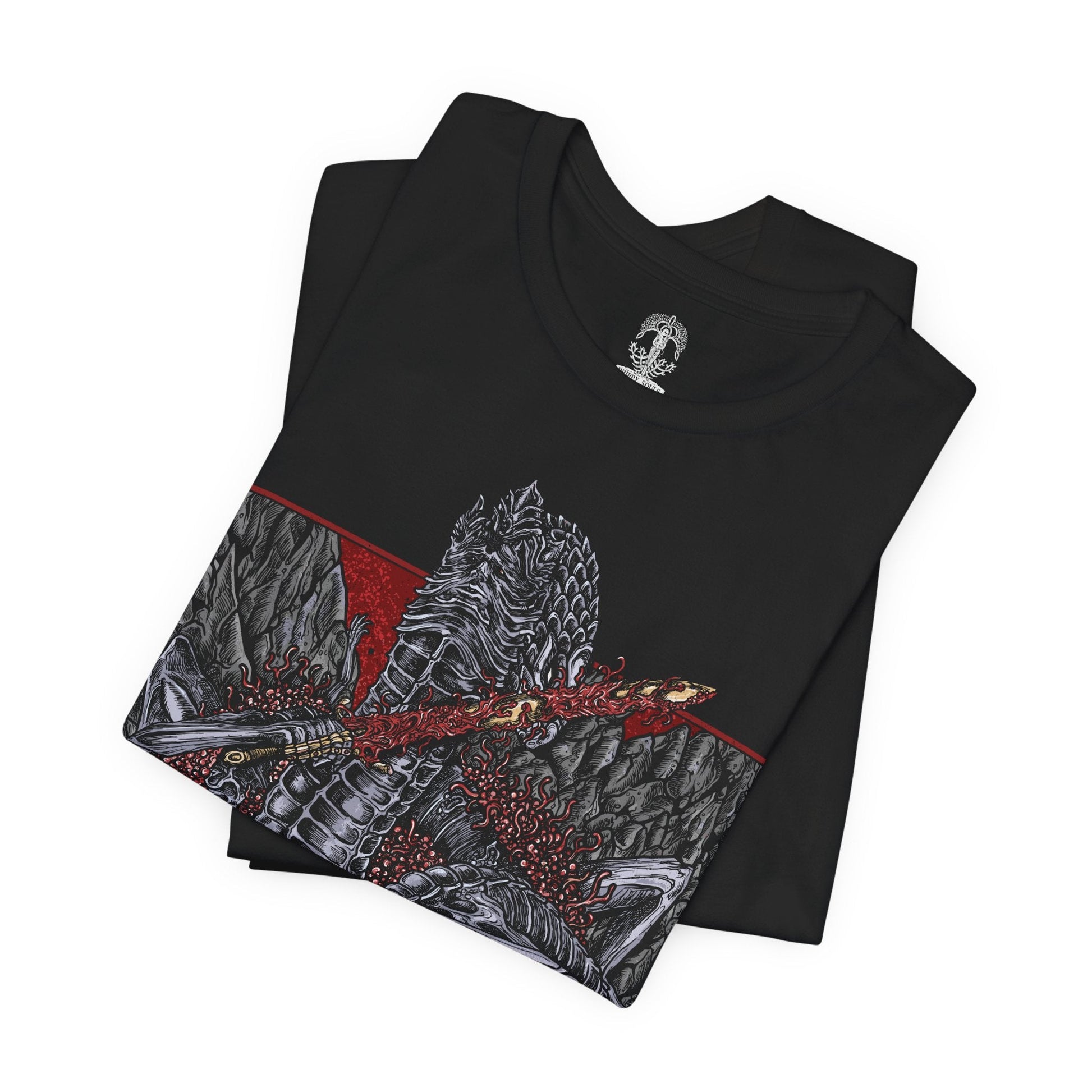Image 5 of a T-shirt featuring Rykard, Lord of Blasphemy from Elden Ring, the demigod who fused with the God-Devouring Serpent in defiance of the Erdtree. Twisted in form and mind, Rykard sacrificed his humanity for power, becoming a grotesque fusion of flesh, flame, and fangs. This design captures his monstrous visage coiled in molten ruin, symbolizing his rebellion against the divine and his descent into unspeakable heresy.