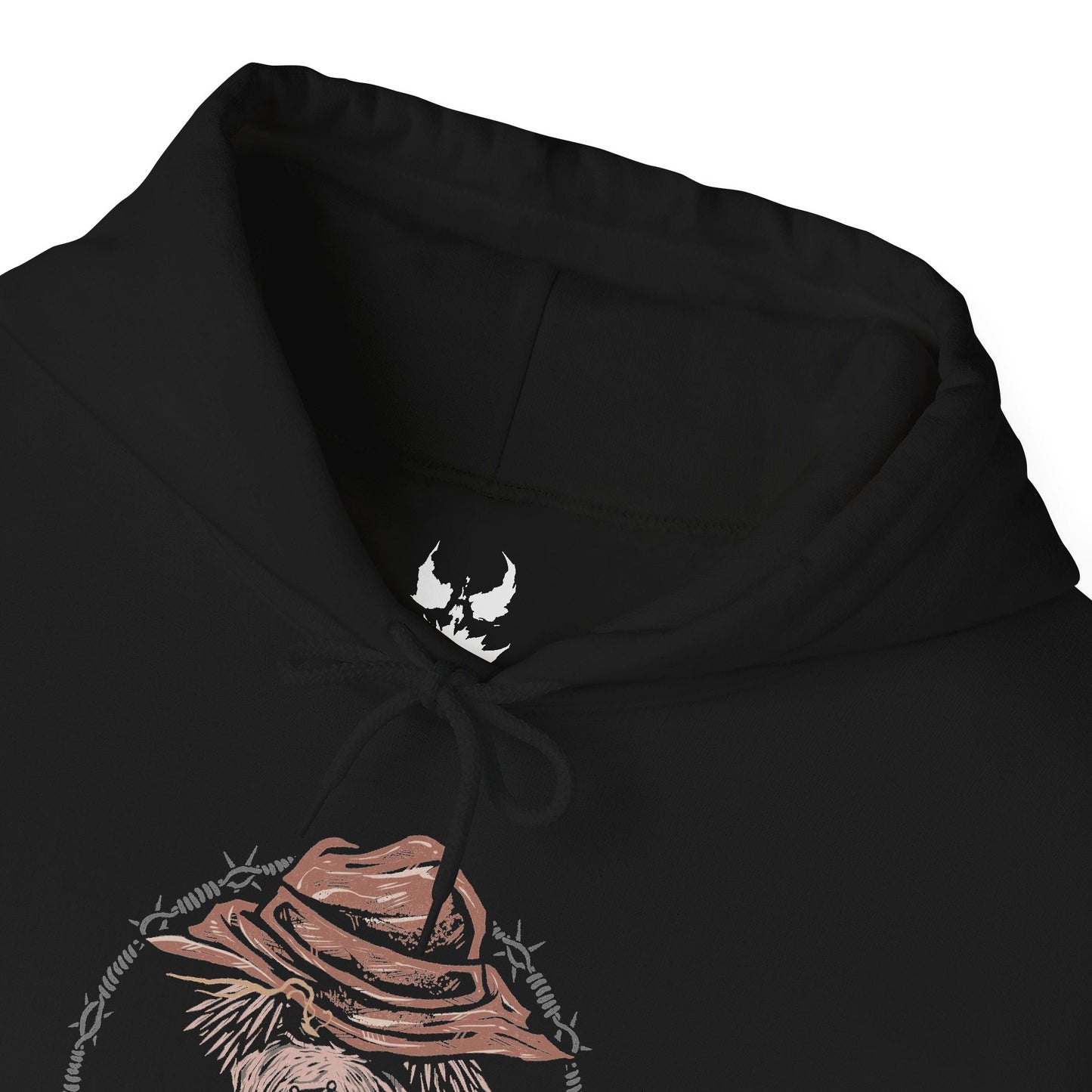 Folded Hooded Sweatshirt of Scarecrow emerging from a cloud of fear toxin while Batman advances through the poisonous haze beneath a storm-filled Gotham sky. The Dark Knight’s silhouette cuts through the nightmare as twisted crows and ghostly apparitions circle overhead. The composition emphasizes psychological horror, unwavering determination, and the iconic rivalry between Gotham’s greatest protector and its master of fear.