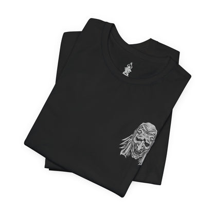 Folded T-shirt artwork depicting the Corrupted Monk’s spectral form torn open to reveal the centipede controlling her corpse. Rotting armor, broken prayer beads, and drifting incense surround the scene as the parasite coils through bone and sinew. This design reflects the blasphemous pursuit of immortality, the corruption of sacred vows, and the nightmarish consequences of defying death in Sekiro’s mythos.