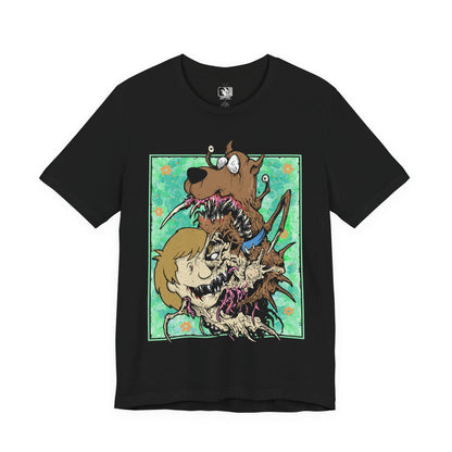 Image 4 of a T-Shirt design of Shaggy Rogers and Scooby-Doo from Scooby-Doo, featuring the iconic best friends together in a playful cartoon-inspired composition. Shaggy wears his recognizable green shirt and brown trousers while Scooby-Doo stands beside him with his signature collar and expressive face. The artwork celebrates their hilarious cowardice, love of food, legendary friendship, and unforgettable adventures solving mysteries with Mystery Inc.