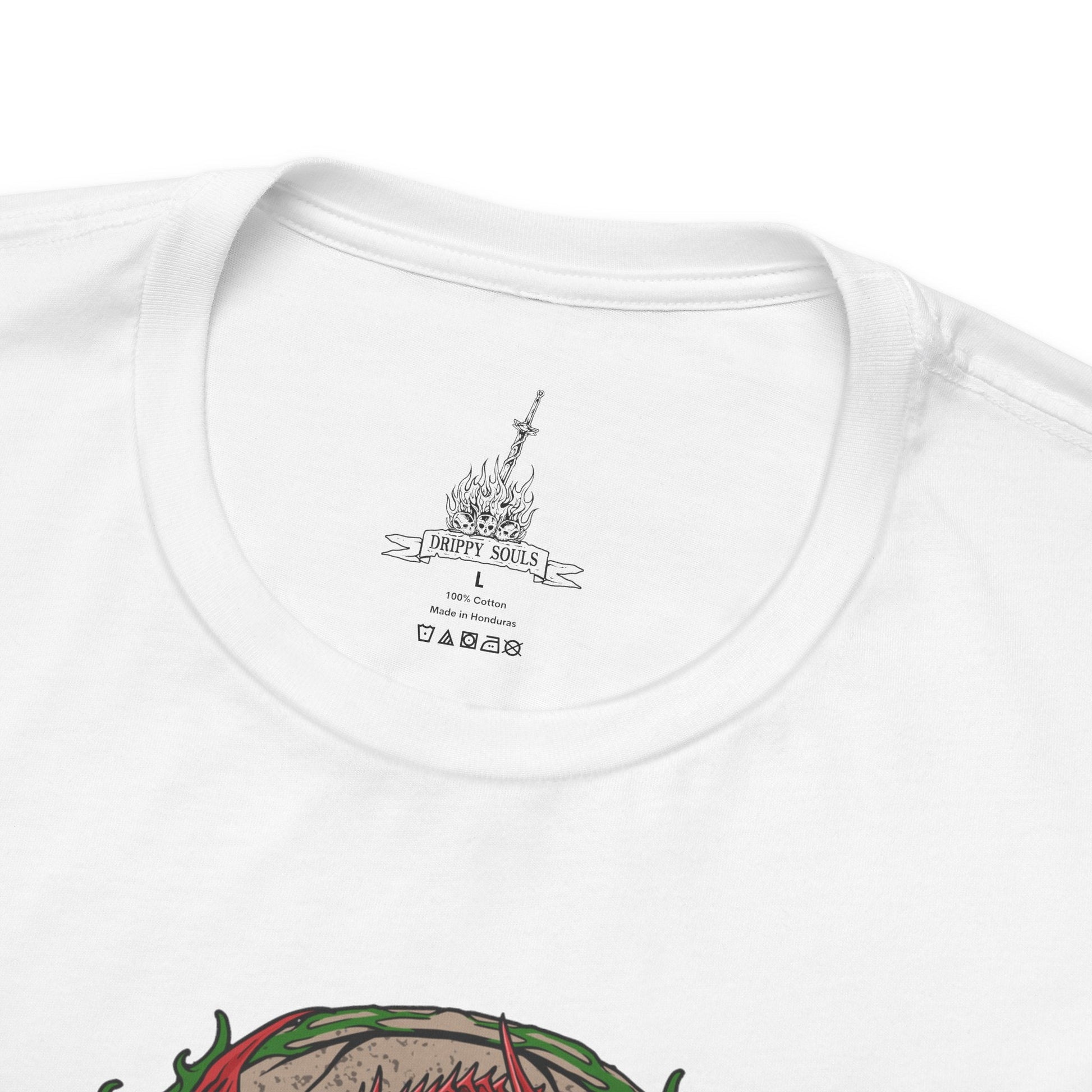 Folded T-shirt featuring Solaire of Astora from Dark Souls, the beloved knight in shining armor who seeks his very own sun. Known for his radiant optimism and the iconic phrase “Praise the Sun,” Solaire stands as a symbol of jolly cooperation in a world of darkness. This design captures his signature pose, embodying hope, loyalty, and light.