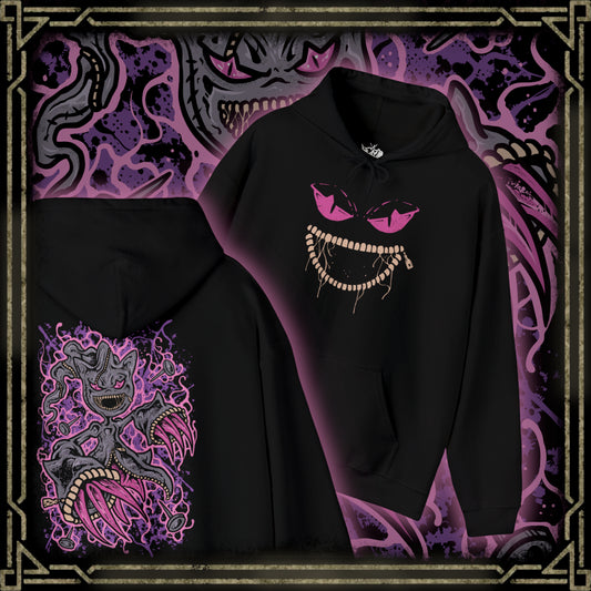 Thumbnail of a Hooded Sweatshirt of Mega Banette floating against a stormy night sky, zipper jaw opened wide as purple shadow energy bursts outward. Its puppet-like frame twists with amplified curse power, symbolizing the unleashed grudge that defines its Mega form. The composition highlights eerie evolution, spectral aggression, and the darker side of Pokémon’s ghostly transformations.