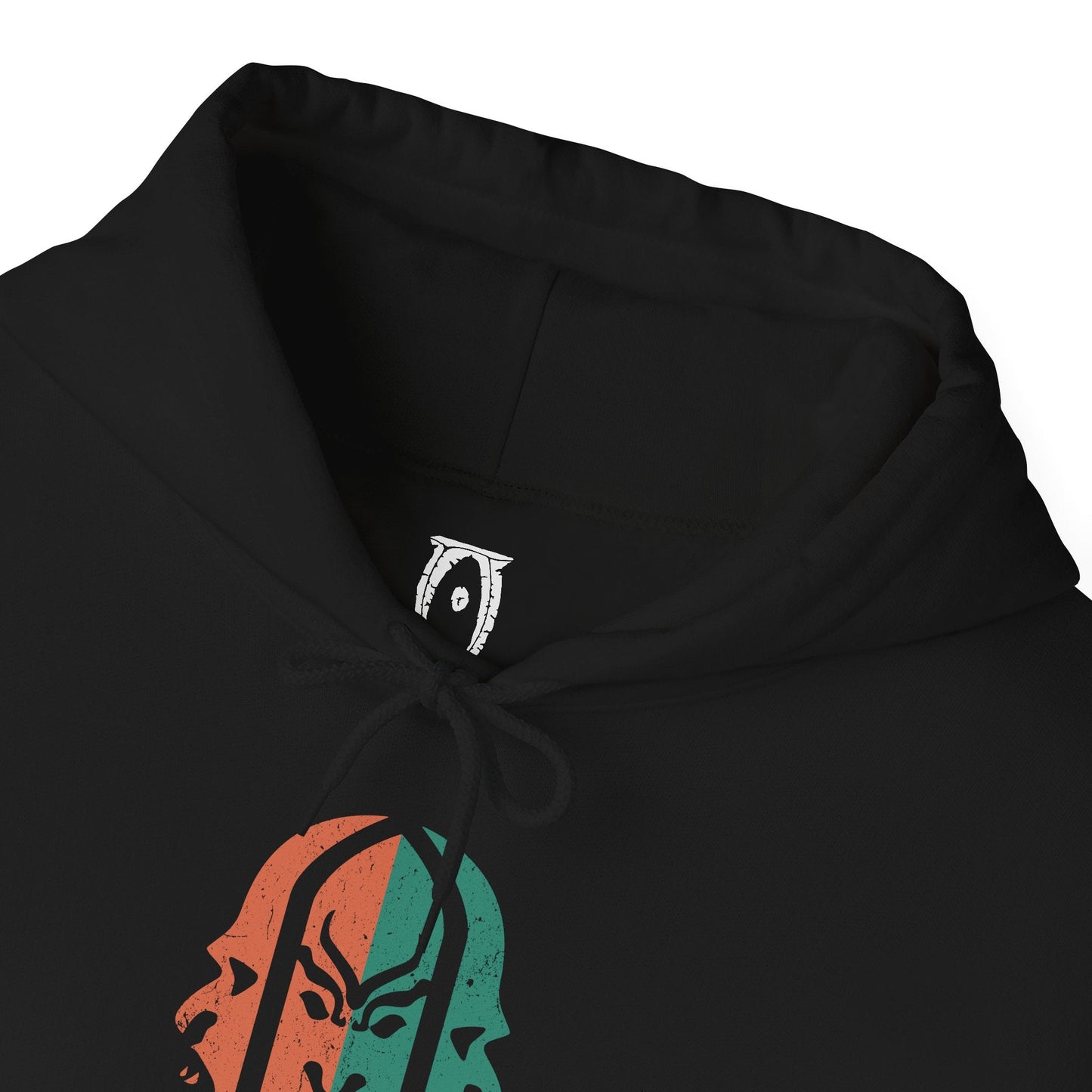 Folded Hooded Sweatshirt of Sheogorath surrounded by surreal landscapes of the Shivering Isles, where twisted fungi, jagged stone, and dreamlike colors reflect his madness. His sinister smile and violent elegance show a Daedric Prince who thrives on chaos, manipulating fate and mortal minds in a realm sculpted entirely by insanity and imagination.