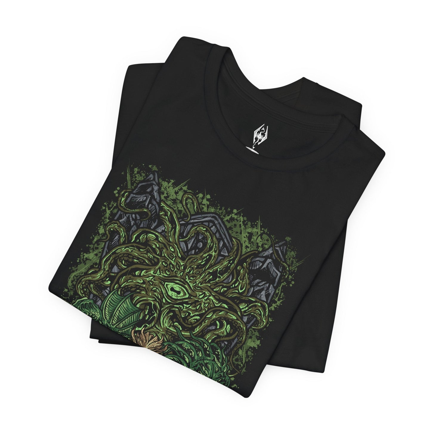 Folded T-shirt featuring Apocrypha, Hermaeus Mora, and Miraak from The Elder Scrolls V: Skyrim – Dragonborn DLC. Set within the endless, shifting library of forbidden knowledge, this design highlights the Watcher of Fate and Tomes and his first Dragonborn servant. Tentacles, ancient runes, and swirling green mists capture Miraak’s betrayal, his hunger for power, and the dark pact binding him to the Daedric Prince of Secrets.