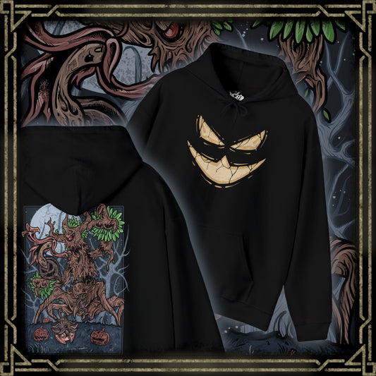 Thumbnail of a Hooded Sweatshirt depicting Trevenant looming over a misty woodland path, its silhouette blending with towering trees as glowing eyes watch from the darkness. Subtle faces seem to form within its bark, hinting at the spirits bound inside. The design reflects Trevenant’s lore as a cursed forest spirit Pokémon, symbolizing vengeance, possession, and the eerie life hidden within Kalos forests.