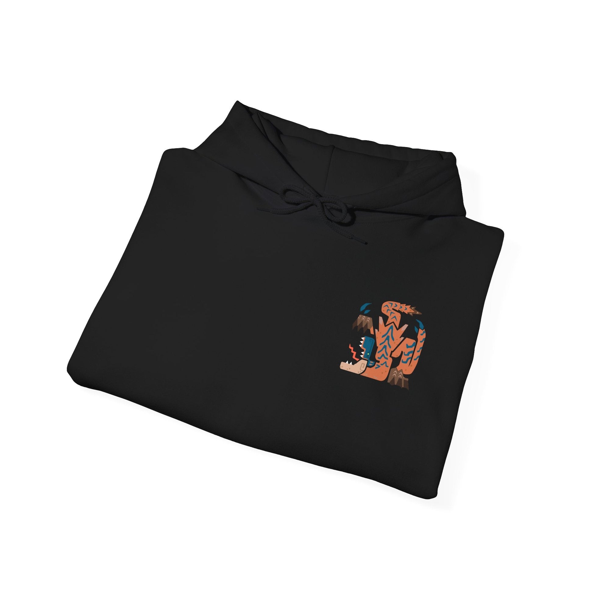 Image 6 of a Hooded Sweatshirt of Tigrex standing atop shattered terrain, roaring into the sky as its powerful limbs brace against the ground. Wind and dust swirl violently around its muscular frame, emphasizing its dominance through sheer physical might. The composition highlights aggression, speed, and the unstoppable nature of one of Monster Hunter’s most iconic and terrifying wyverns.