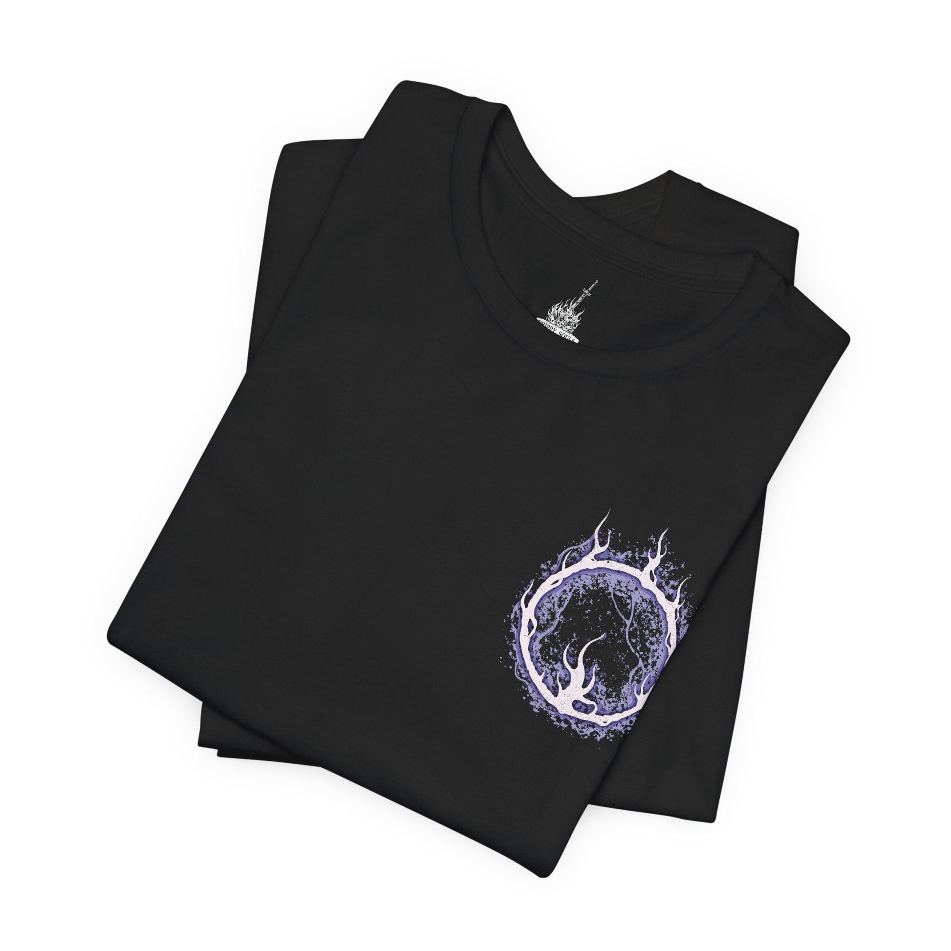 Image 6 of a T-Shirt artwork depicting Lorian, Elder Prince, kneeling amid the ashes of Lothric Castle while Lothric rests upon his back and prepares to unleash radiant magic. Golden light contrasts with Lorian's dark, flame-scarred armor as the brothers face their final battle. This design reflects their shared curse, unwavering devotion, and the tragic relationship at the heart of the Princes' story.