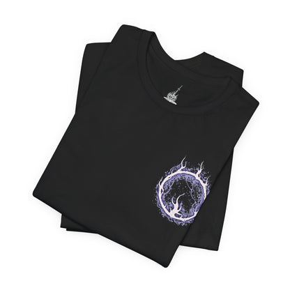 Image 6 of a T-Shirt artwork depicting Lorian, Elder Prince, kneeling amid the ashes of Lothric Castle while Lothric rests upon his back and prepares to unleash radiant magic. Golden light contrasts with Lorian's dark, flame-scarred armor as the brothers face their final battle. This design reflects their shared curse, unwavering devotion, and the tragic relationship at the heart of the Princes' story.