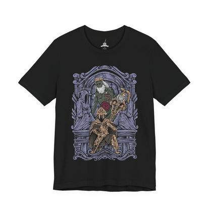 Image 4 of a T-Shirt design of Velstadt, the Royal Aegis from Dark Souls II, standing guard beside the Undead Crypt throne as dark mist coils around his massive bell hammer. His heavy black armor reflects faint purple light while candles flicker through the crypt’s endless darkness. The design captures Velstadt’s unwavering loyalty to King Vendrick and the solemn duty that bound him to eternal vigilance.