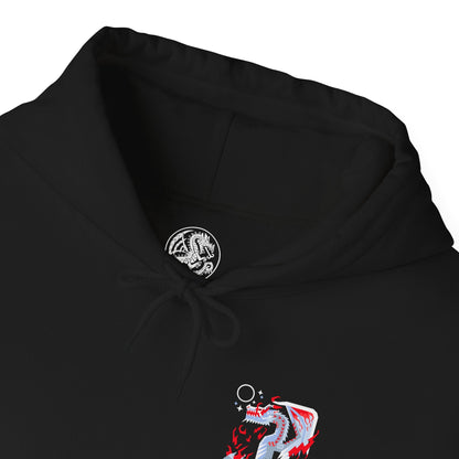 Folded Hooded Sweatshirt of White Fatalis emerging from dark storm clouds, its serpentine body illuminated by crimson thunder while ancient ruins collapse beneath it. Its white scales glow against the chaos of the sky, creating an image of divine terror and unstoppable destruction. The composition emphasizes legendary power, fear, and the near-apocalyptic aura surrounding one of Monster Hunter’s most feared Elder Dragons.